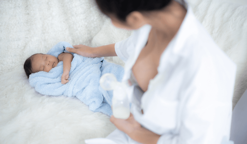 breast feeding baby by using a pump