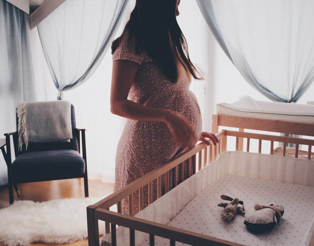 pregnant woman in nursery